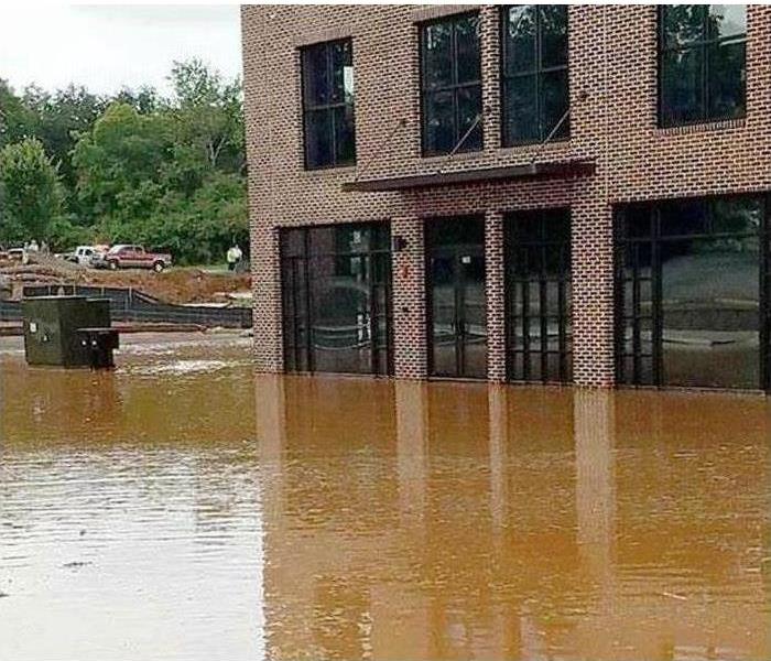 Floodwaters surrounding building 